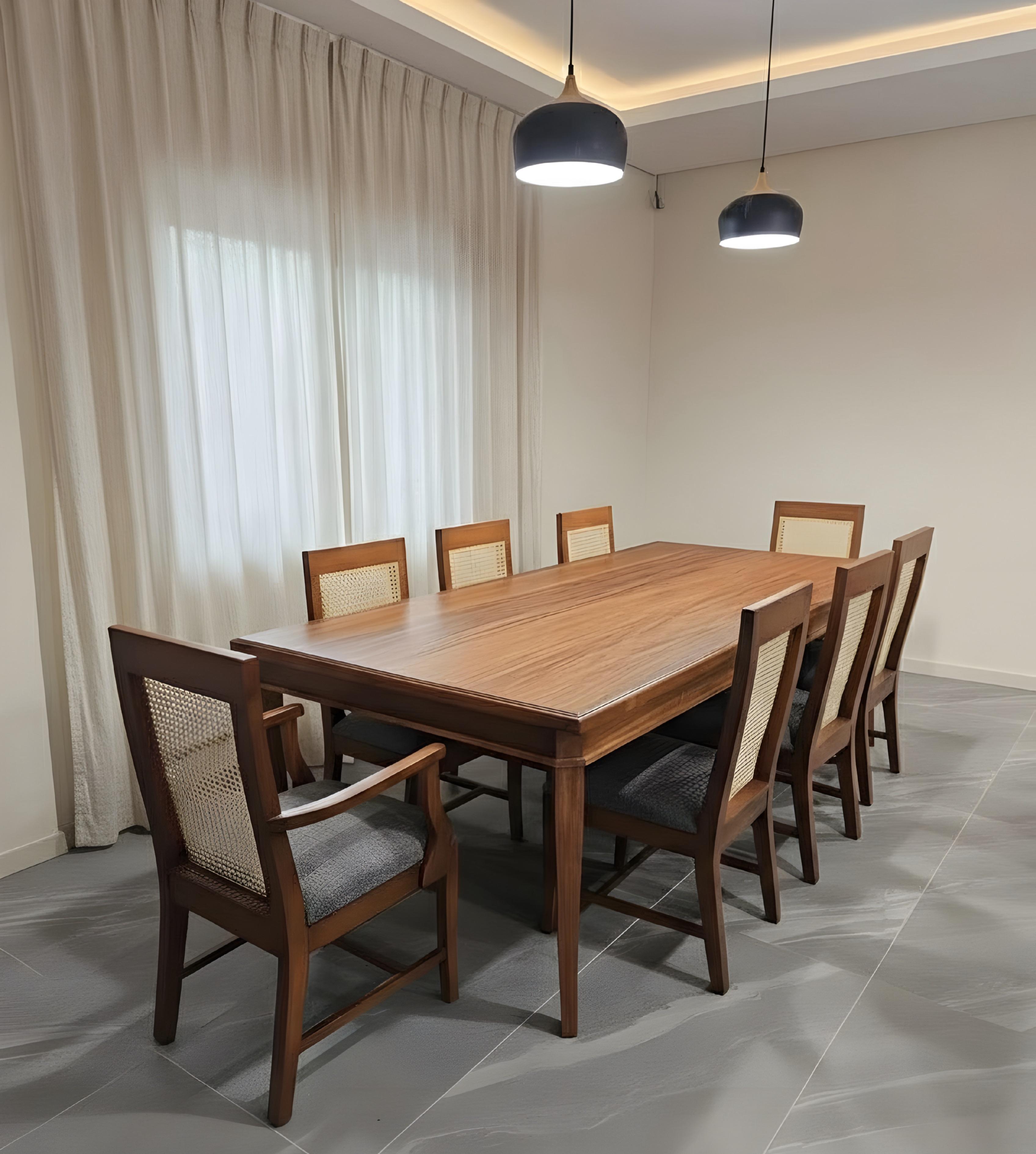 A completed solid-wood dining set in a home interior.